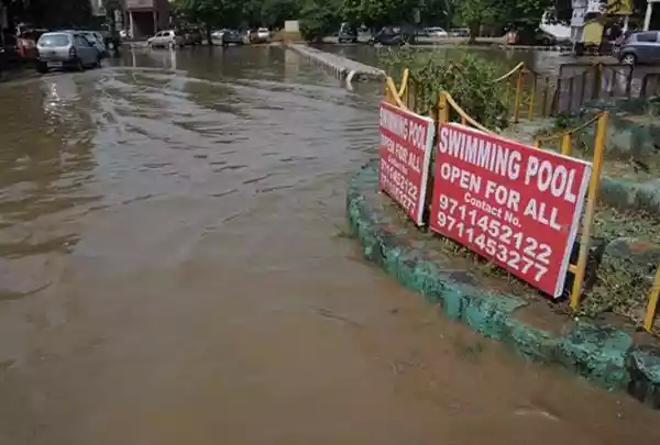 bad-ad-placement-mud-puddle-swimming-pool.png